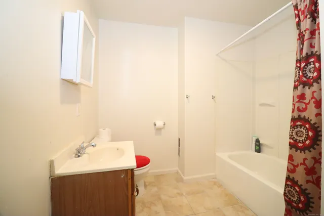 a bathroom with a sink and a bathtub