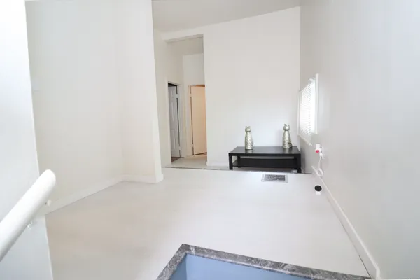 a view of a living room with furniture