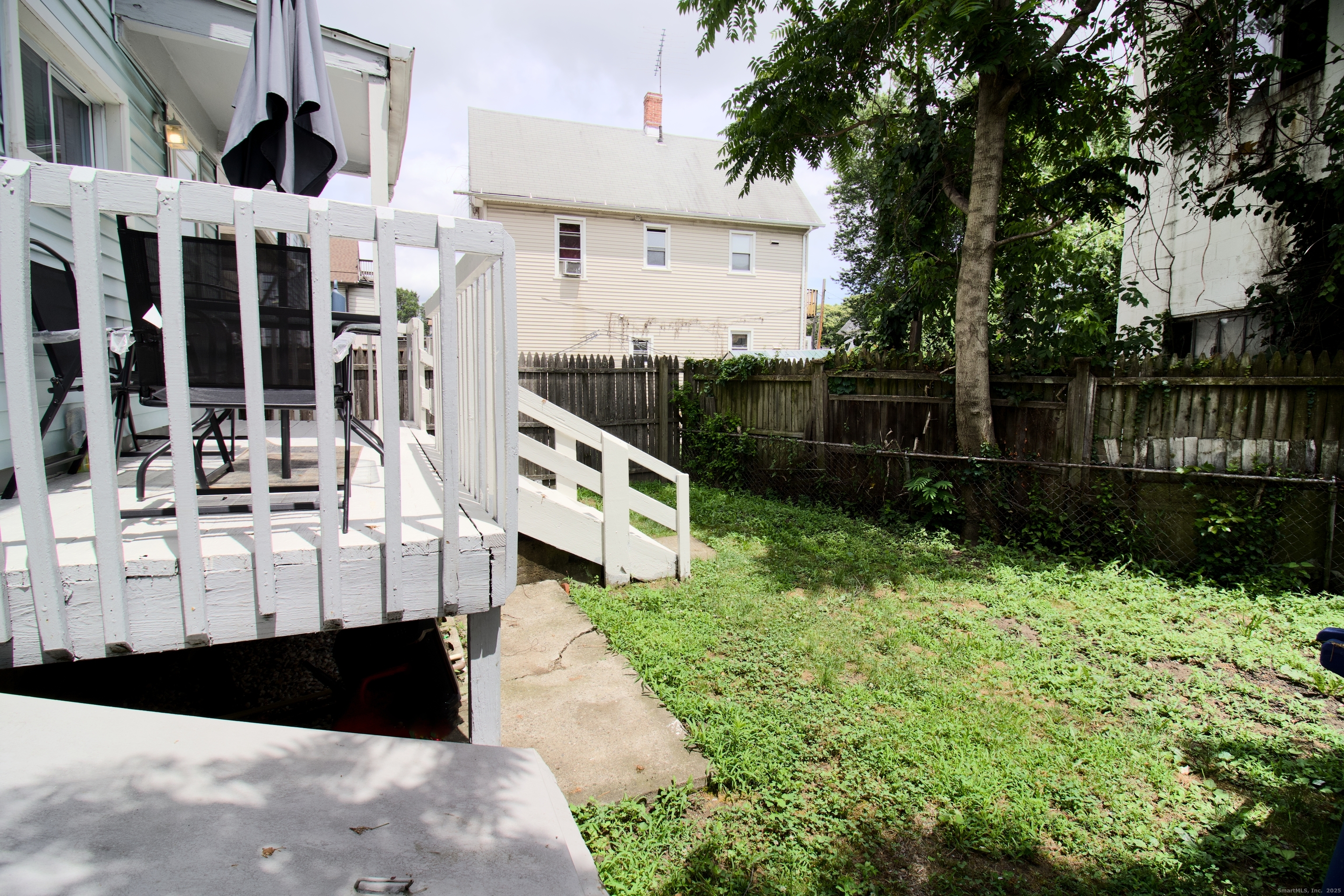 60 Olive Street Bridgeport, CT 06605 - Photo 33 of 34 a view of a house with a yard