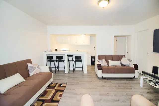 a living room with furniture and a couch