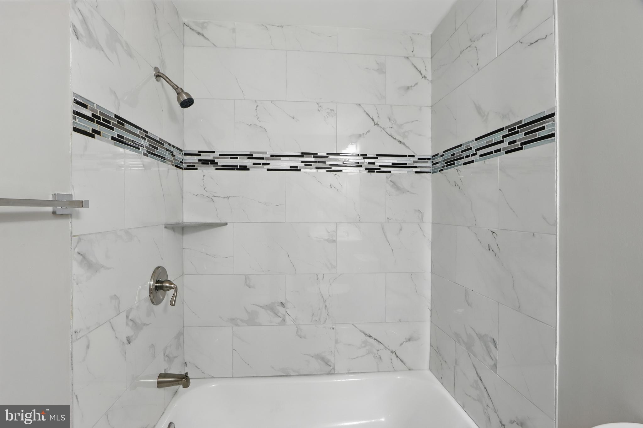 9021 Meadow Heights Road Randallstown, MD 21133 - Photo 19 of 41 a close view of a bathtub in bathroom