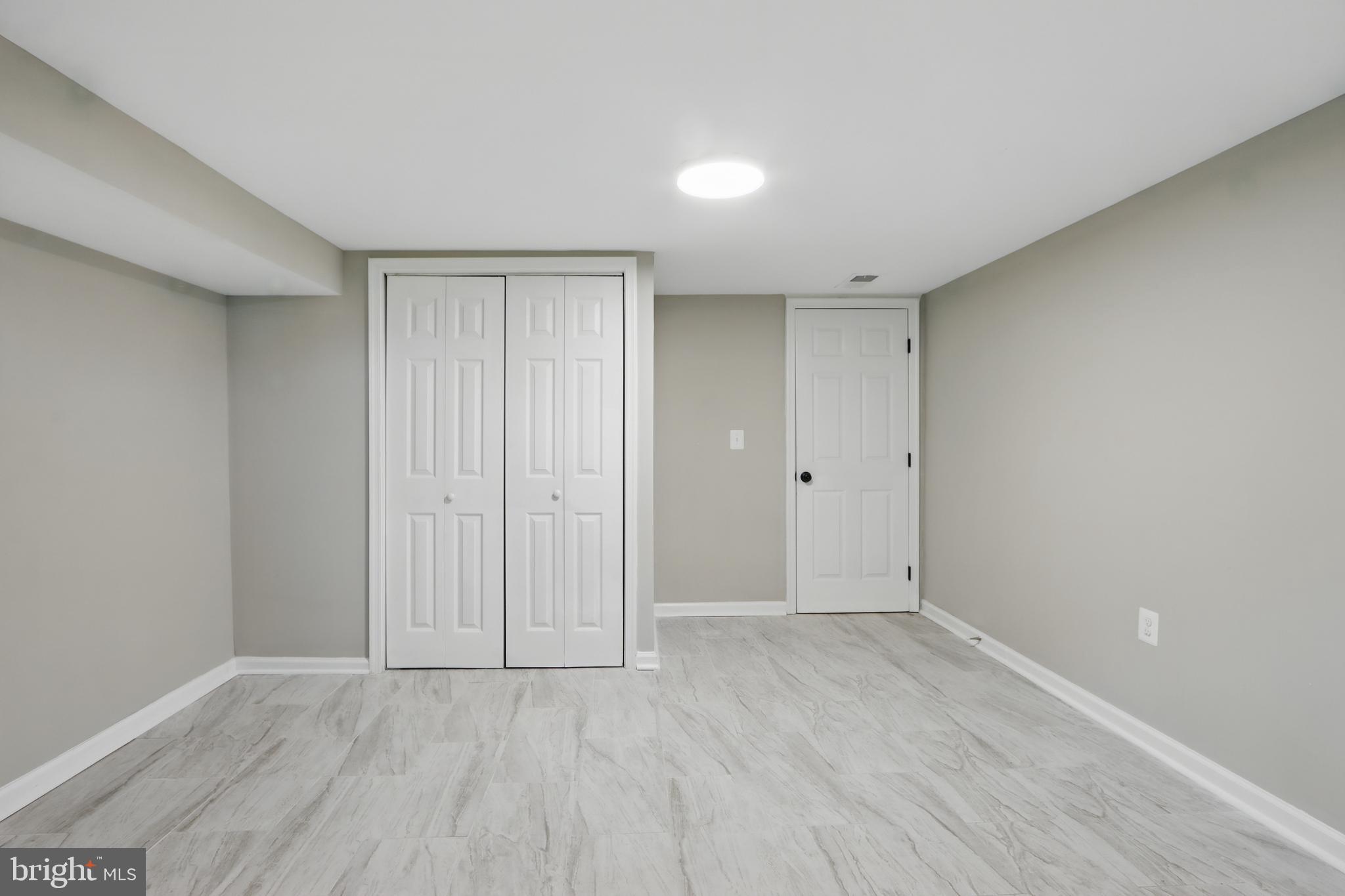 9021 Meadow Heights Road Randallstown, MD 21133 - Photo 29 of 41 a view of an empty room
