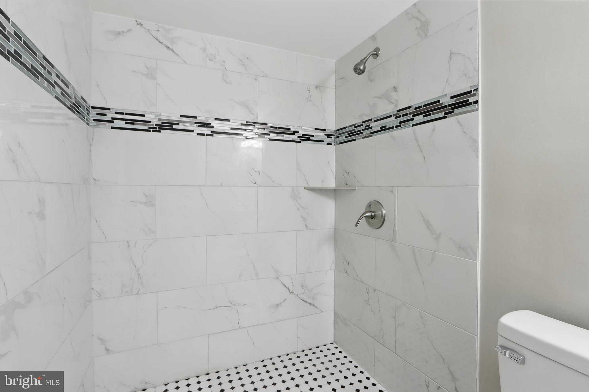9021 Meadow Heights Road Randallstown, MD 21133 - Photo 30 of 41 a bathroom with a shower