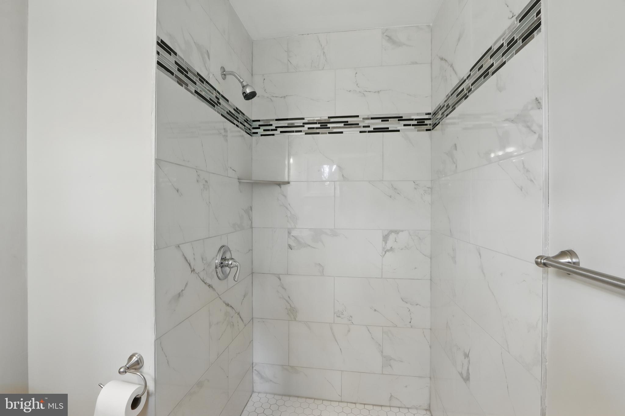 9021 Meadow Heights Road Randallstown, MD 21133 - Photo 31 of 41 a bathroom with a shower