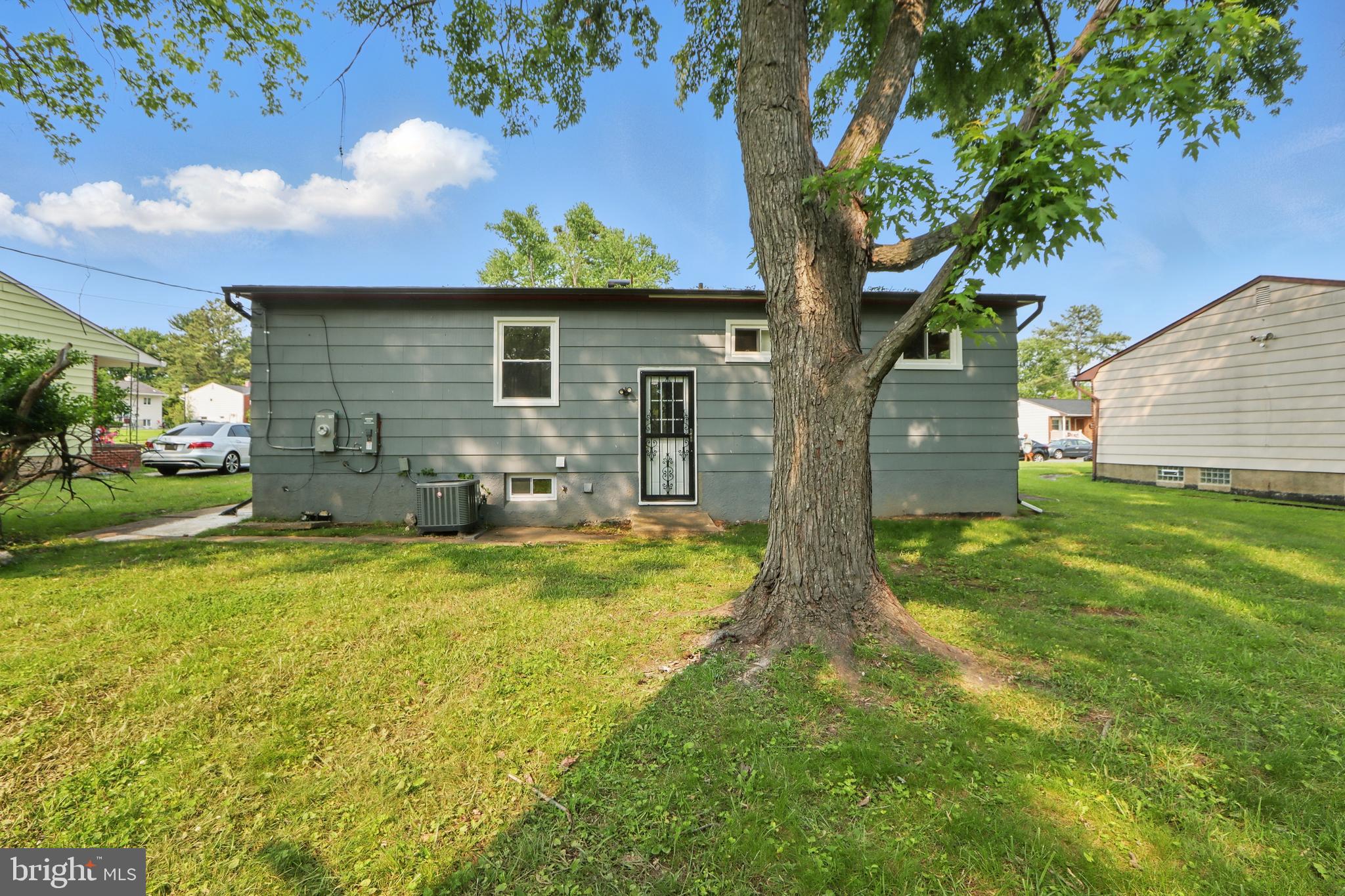9021 Meadow Heights Road Randallstown, MD 21133 - Photo 40 of 41 a view of a house with a yard