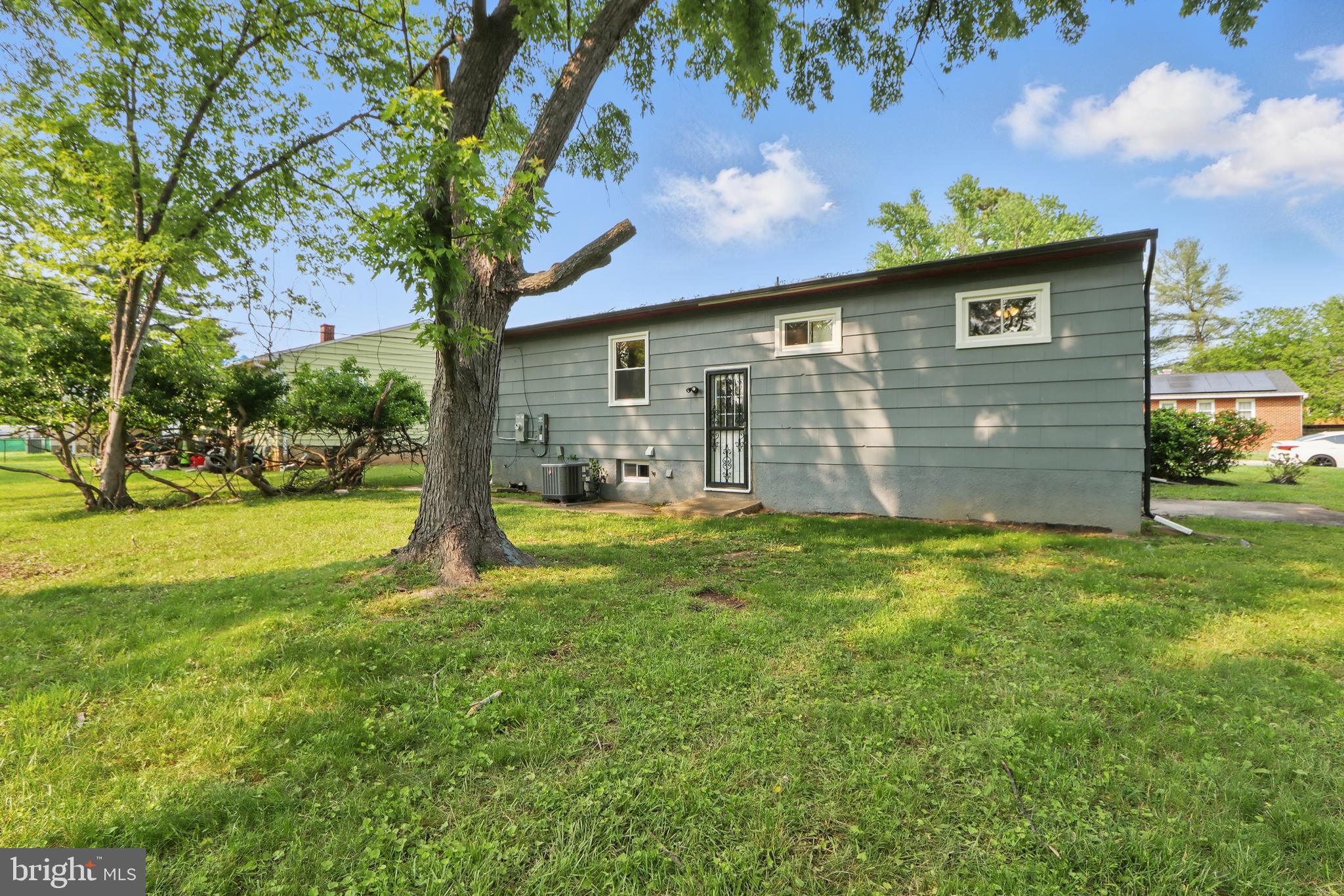 9021 Meadow Heights Road Randallstown, MD 21133 - Photo 41 of 41 a view of a house with a backyard