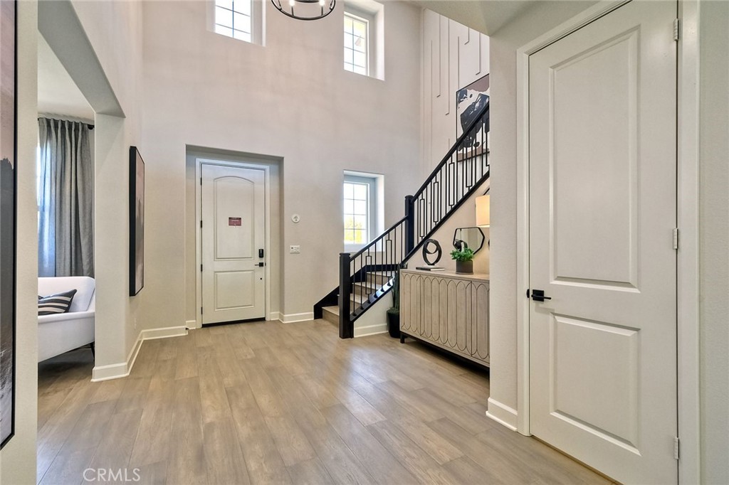 3131 Orchard Glen Escondido, CA 92026 - Photo 18 of 35 a view of an entryway with wooden floor