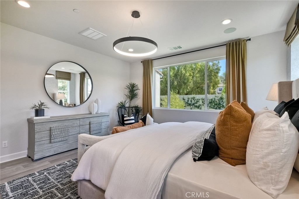 3131 Orchard Glen Escondido, CA 92026 - Photo 25 of 35 a bedroom with a large bed and a large window