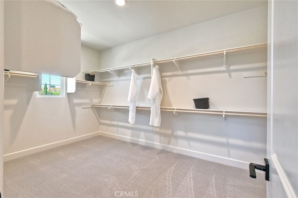 3131 Orchard Glen Escondido, CA 92026 - Photo 28 of 35 a view of an empty walk in closet