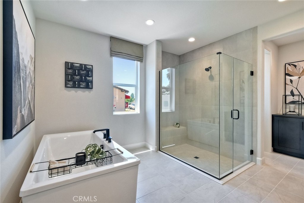 3131 Orchard Glen Escondido, CA 92026 - Photo 29 of 35 a bathroom with a shower sink and mirror