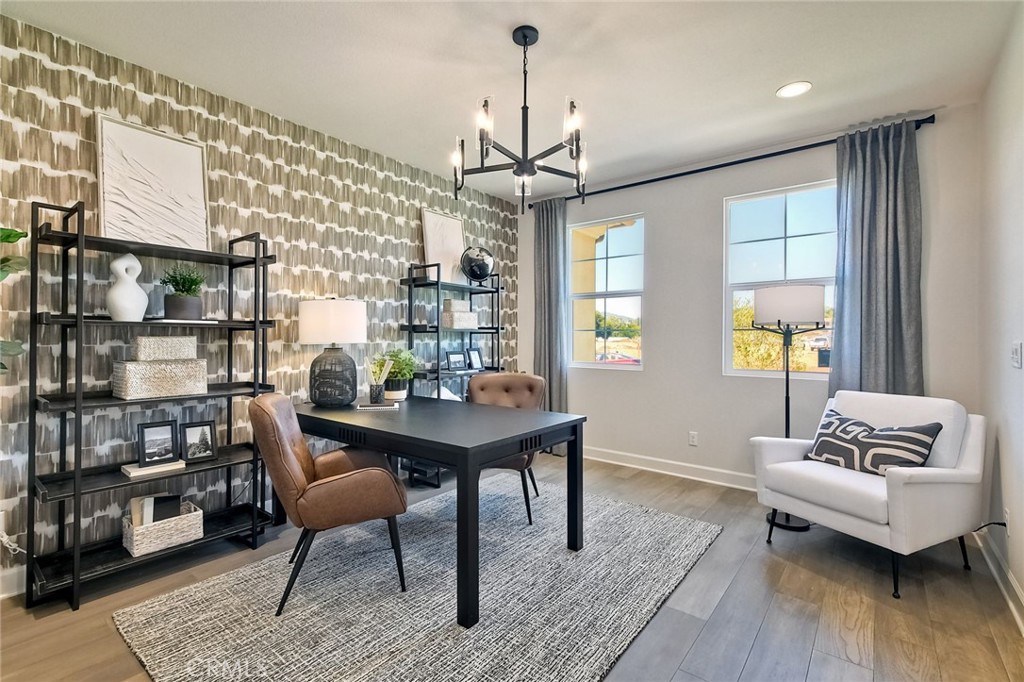 3131 Orchard Glen Escondido, CA 92026 - Photo 32 of 35 a living room with furniture a window and a chandelier