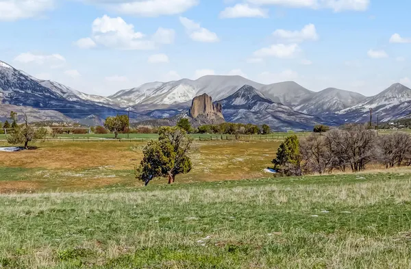 a view of a city with an ocean