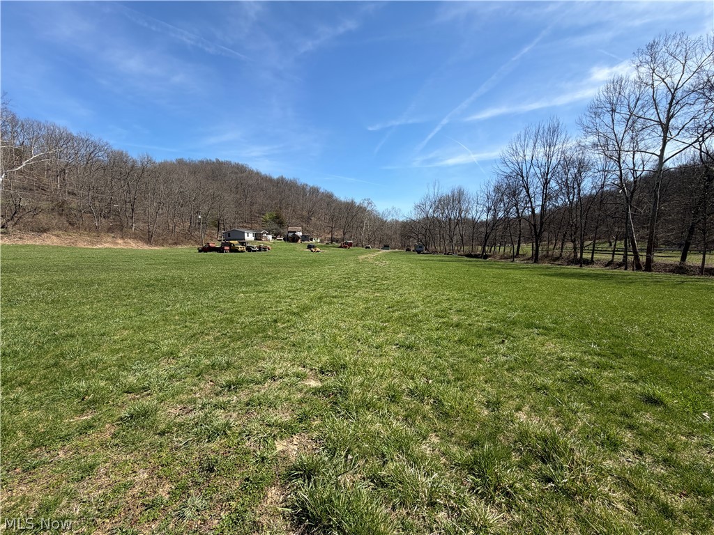 1285 Moody Hollow Road Blue Rock, OH 43720 - Photo 18 of 20 View of grassy yard featuring a rural view