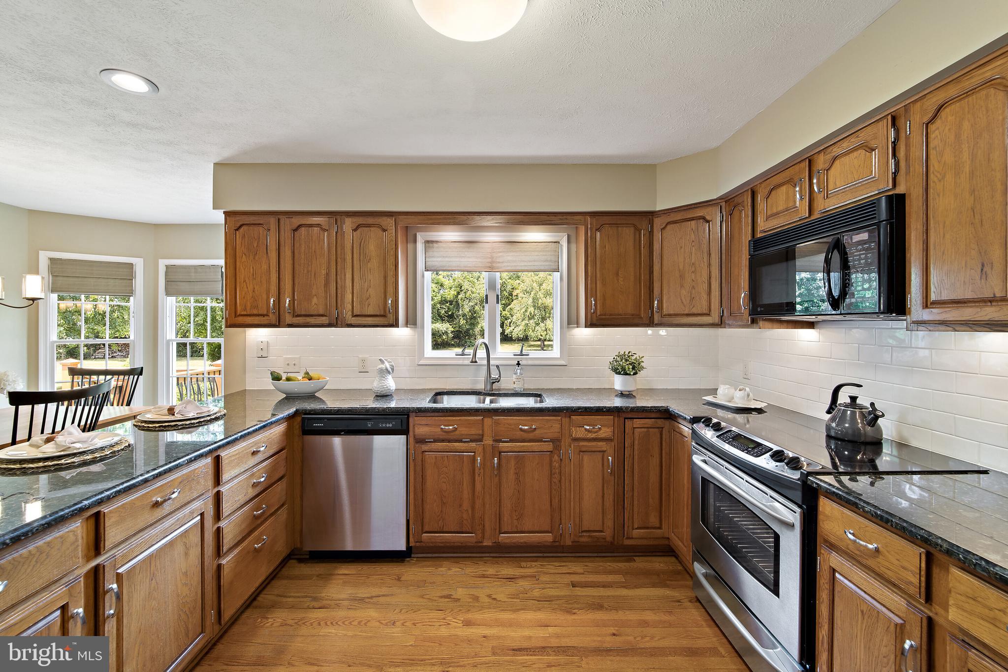 439 Kimble Road Berryville, VA 22611 - Photo 8 of 77 GOURMET KITCHEN W/ WHITE SUBWAY TILE BACKSPLASH...