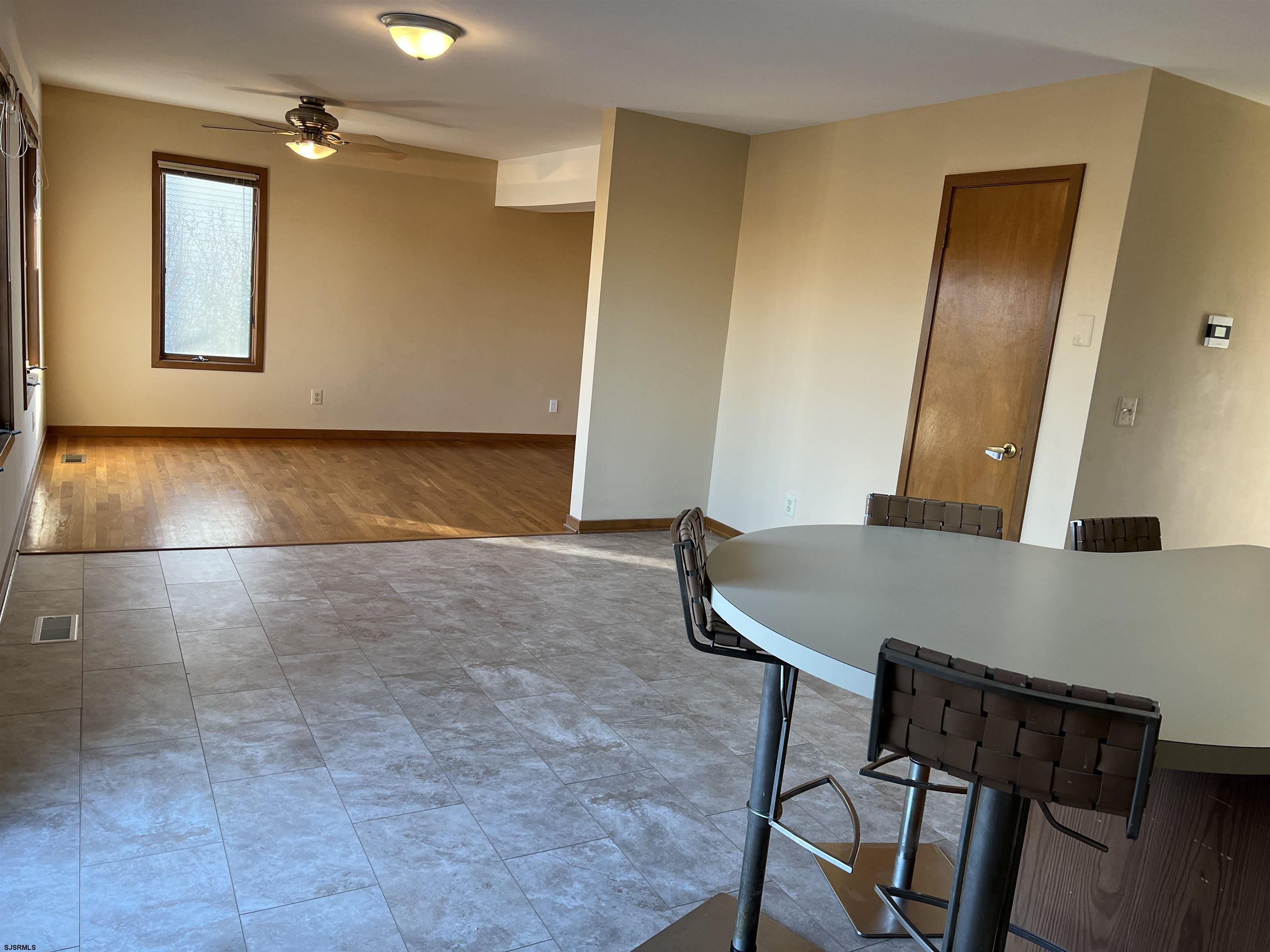 215 Hagen Road Brigantine, NJ 08203 - Photo 5 of 21 a view of a room with furniture and wooden floor