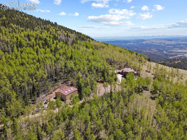 a view of a garden with a patio