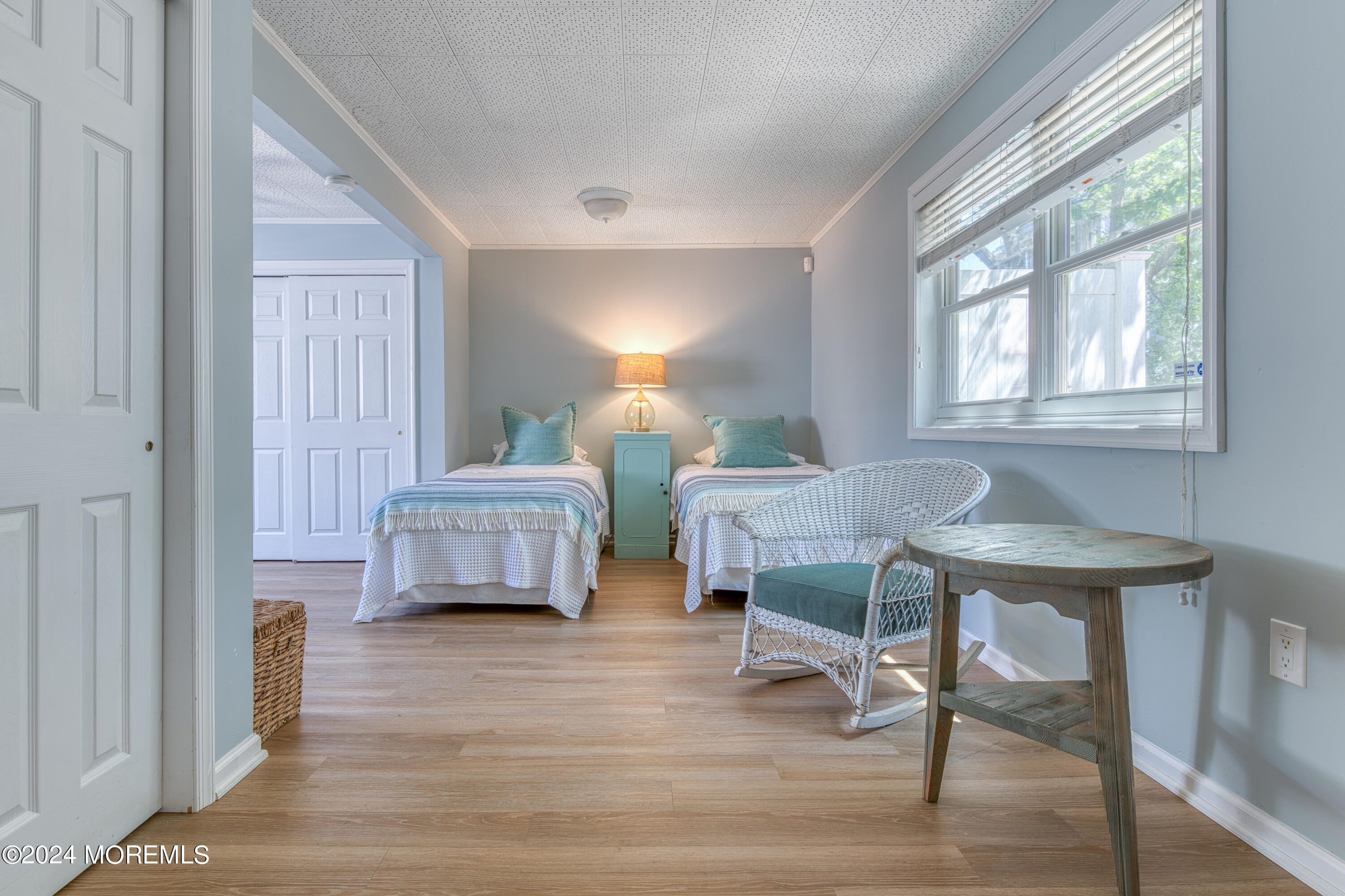 19 Via Ripa Way Sea Bright, NJ 07760 - Photo 16 of 37 a bedroom with furniture and a window