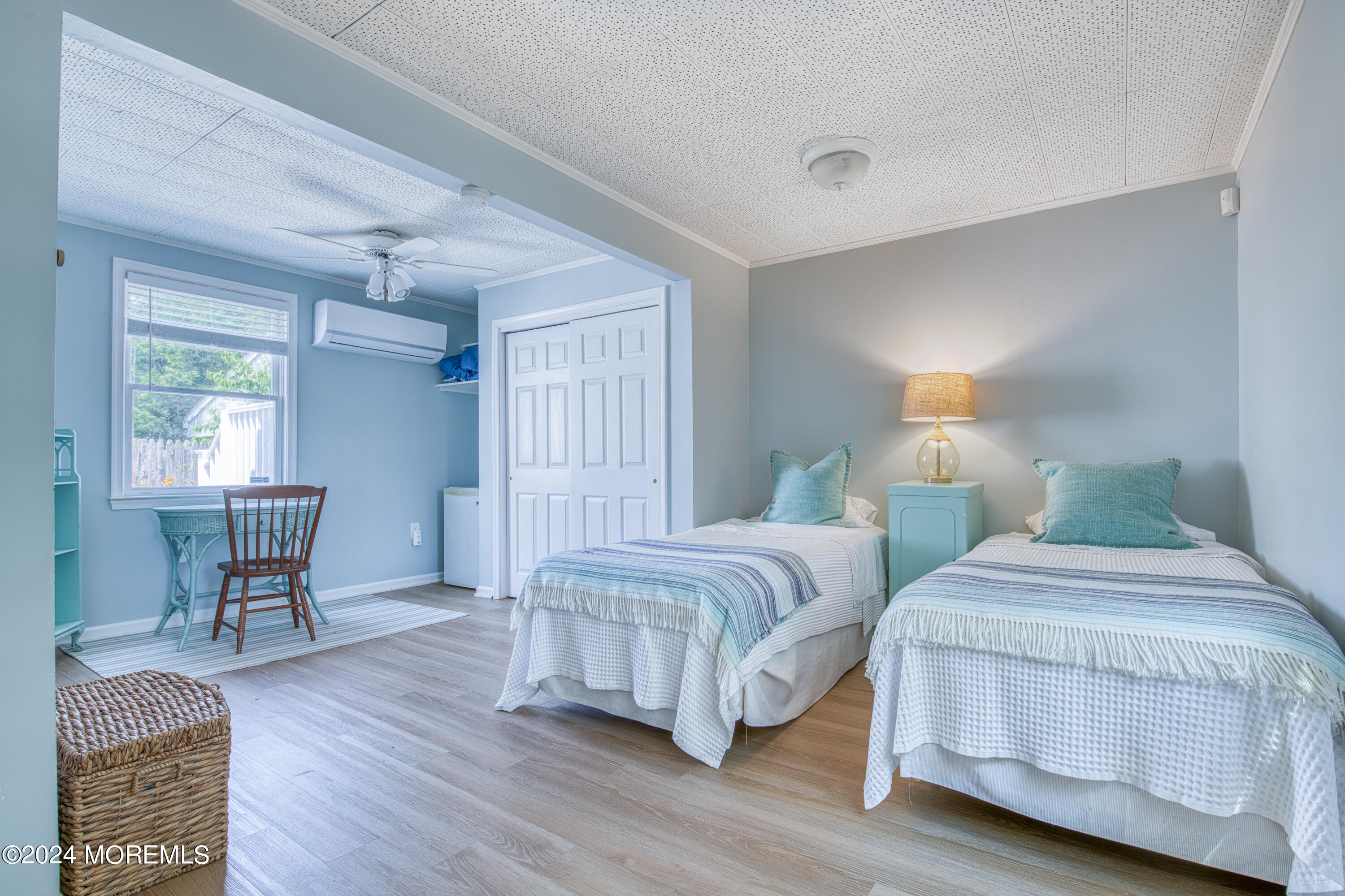 19 Via Ripa Way Sea Bright, NJ 07760 - Photo 17 of 37 a spacious bedroom with two beds and a chair