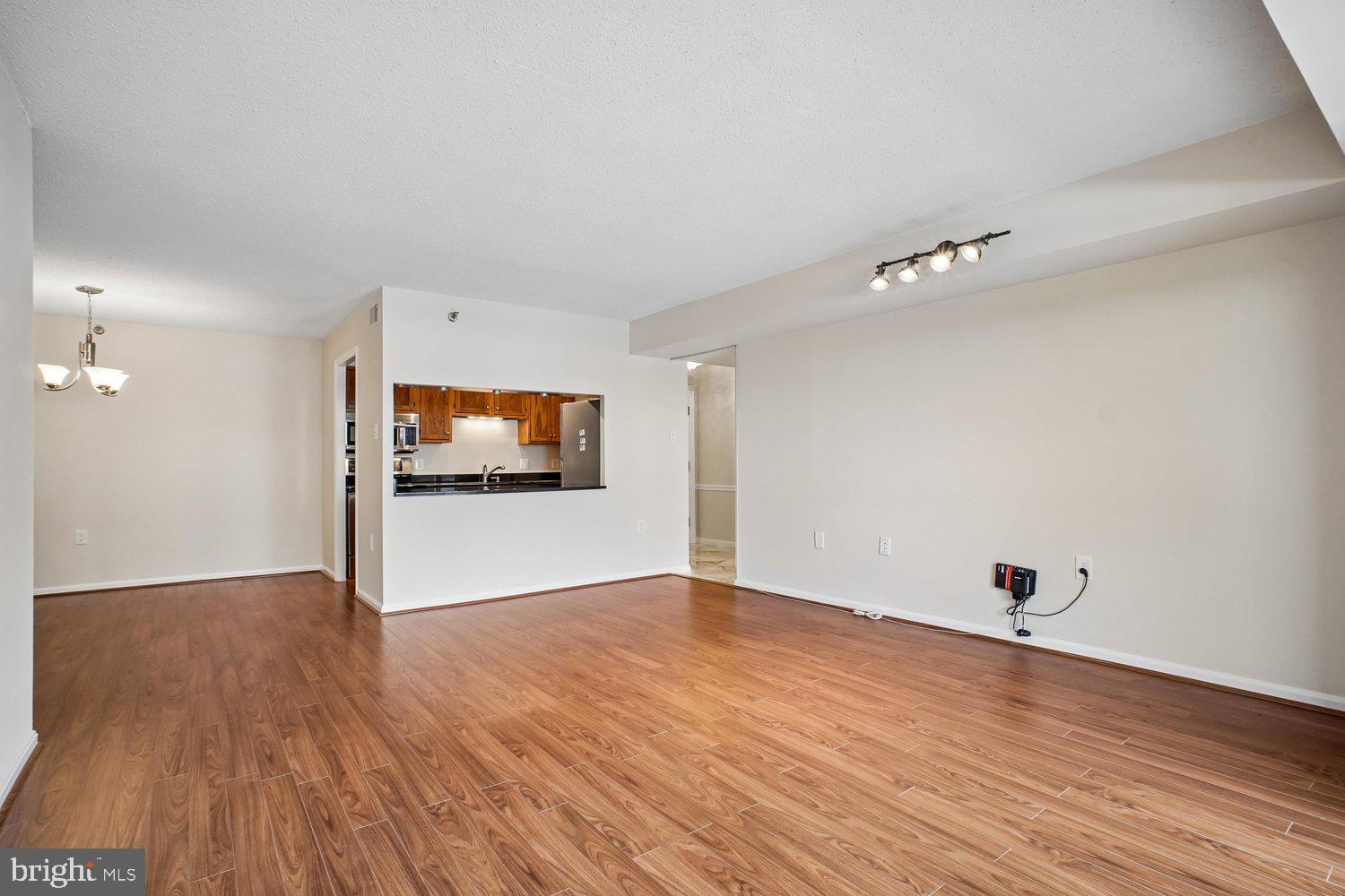 1301 North Courthouse Road, Unit 1612 Arlington, VA 22201 - Photo 11 of 52 Living Room w/Breakfast Bar to Kitchen