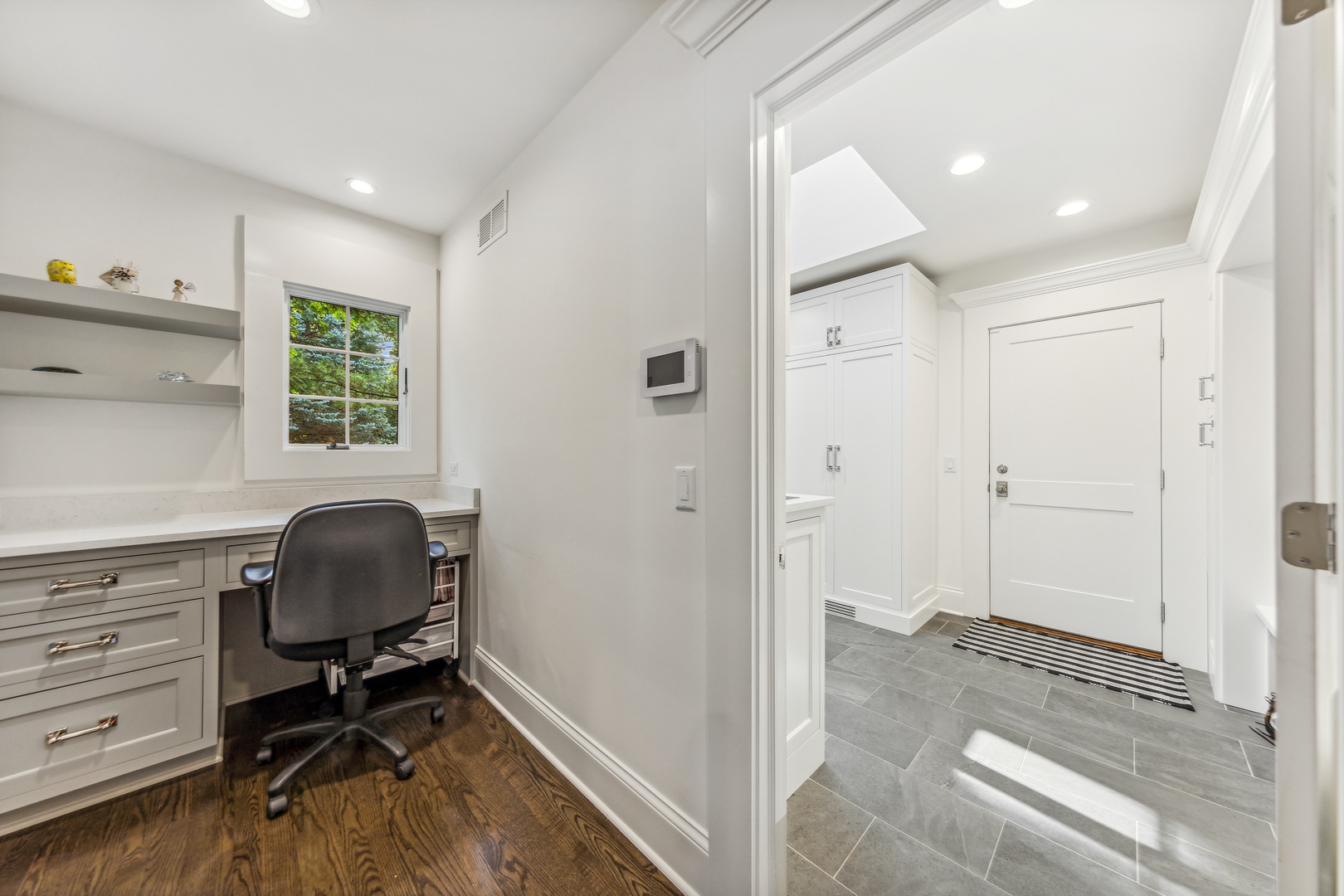 202 Burr Ridge Club Burr Ridge, IL 60527 - Photo 15 of 31 a view of a workspace with furniture and a window