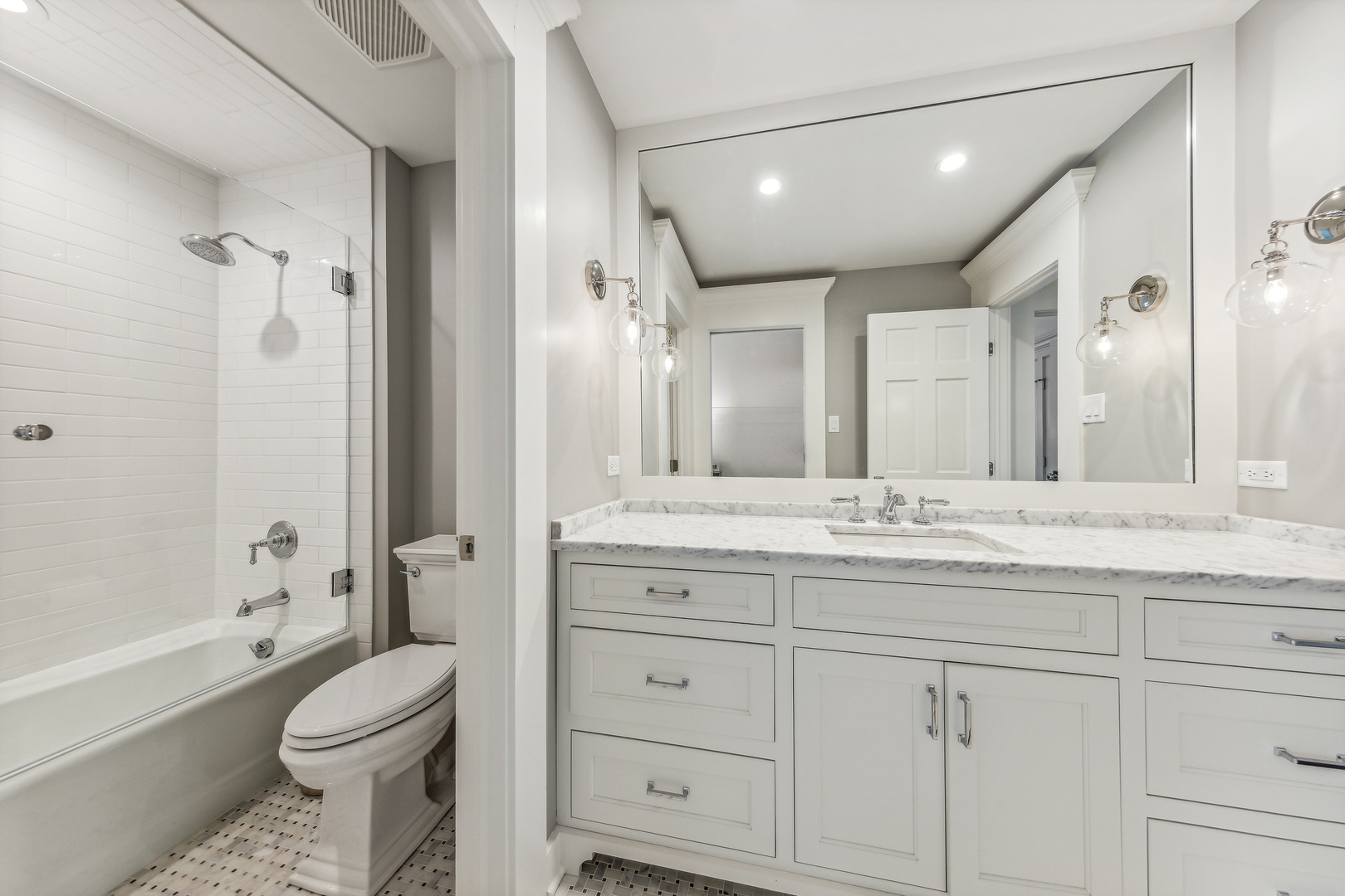 202 Burr Ridge Club Burr Ridge, IL 60527 - Photo 22 of 31 a bathroom with a granite countertop toilet sink and mirror