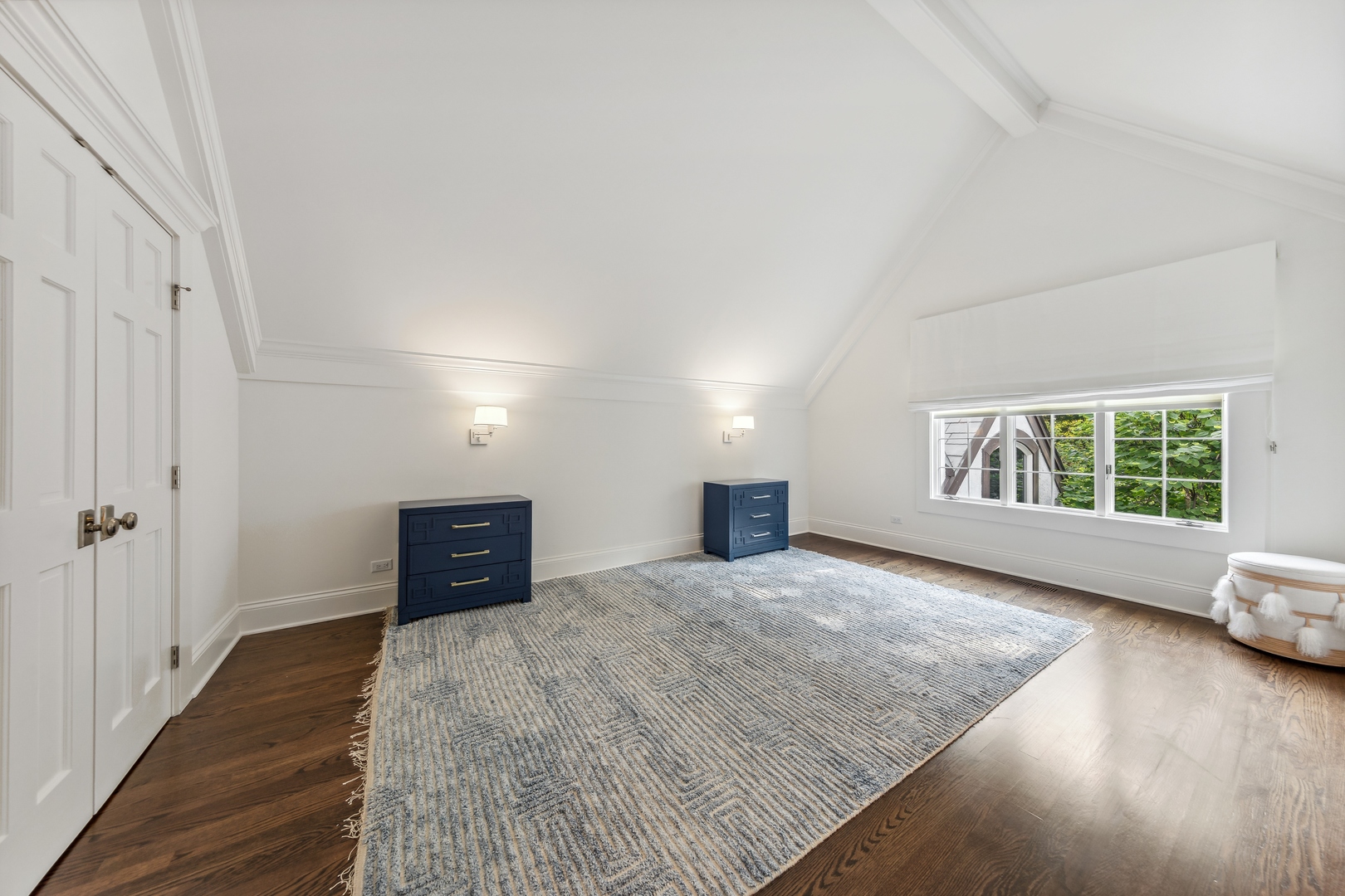 202 Burr Ridge Club Burr Ridge, IL 60527 - Photo 23 of 31 a view of an empty room with wooden floor and a window