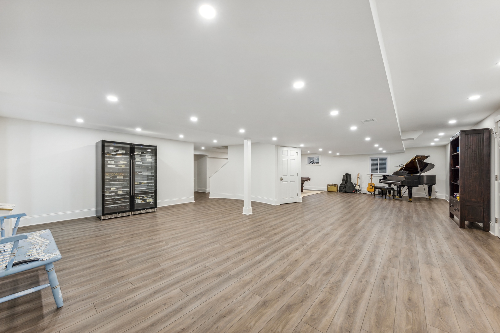 202 Burr Ridge Club Burr Ridge, IL 60527 - Photo 24 of 31 a view of a big room with wooden floor and windows