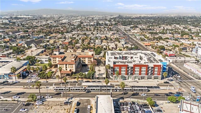 an aerial view of a city with streets and houses