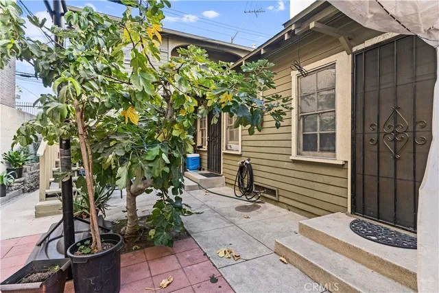 a house view with a outdoor space