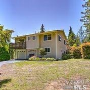 41501 Iversen Road Gualala, CA 95445 - Photo 1 of 1 a front view of house with yard