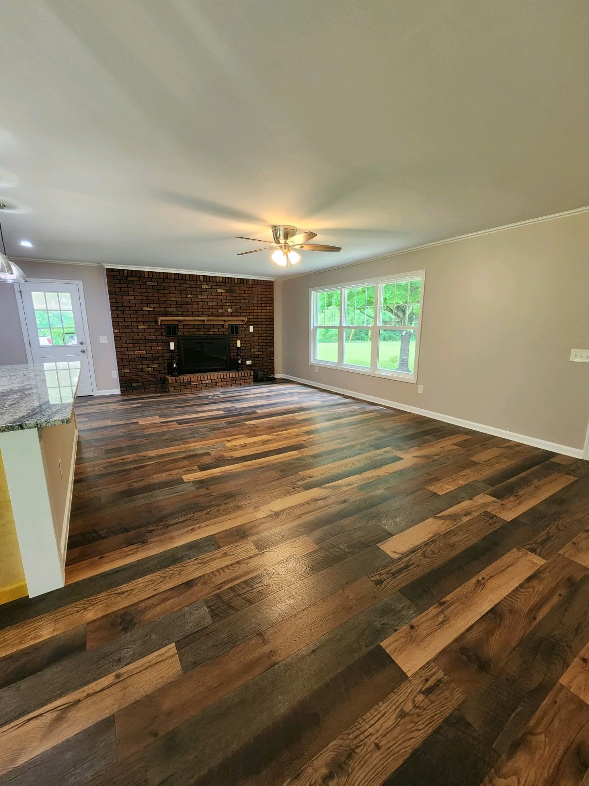 804 Crews Hollow Road Manchester, TN 37355 - Photo 6 of 29 New Flooring Owners replaced all the flooring throughout the home with LVT flooring and tile in the bathrooms.
