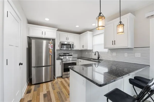 $375,000 | 507 Southwest Meadowood Drive, Grain Valley, MO 64029