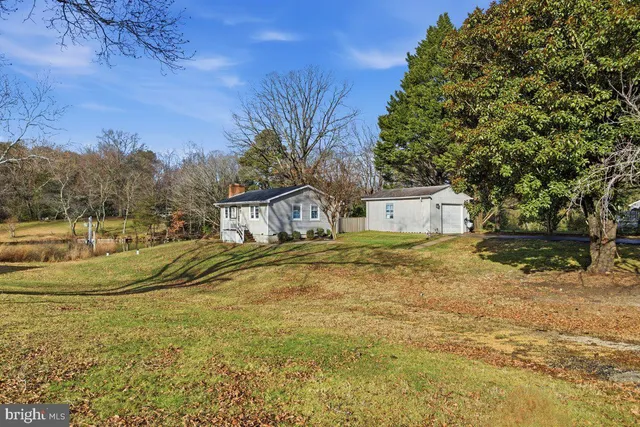 a house view with a trees