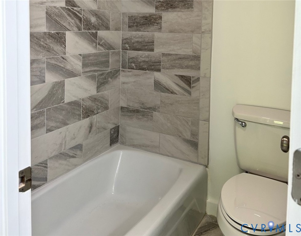 10396 Iron Mill Road North Chesterfield, VA 23235 - Photo 12 of 23 a bathroom with a toilet and a shower