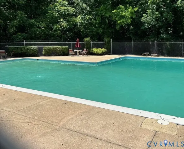 a swimming pool with a yard