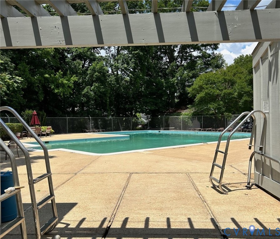 10396 Iron Mill Road North Chesterfield, VA 23235 - Photo 20 of 23 a view of swimming pool with an outdoor space and seating area