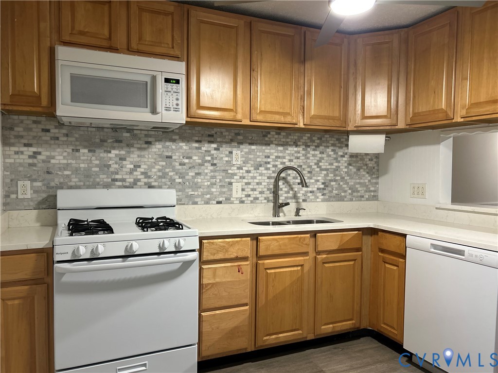 10396 Iron Mill Road North Chesterfield, VA 23235 - Photo 7 of 23 a kitchen with cabinets appliances and a sink