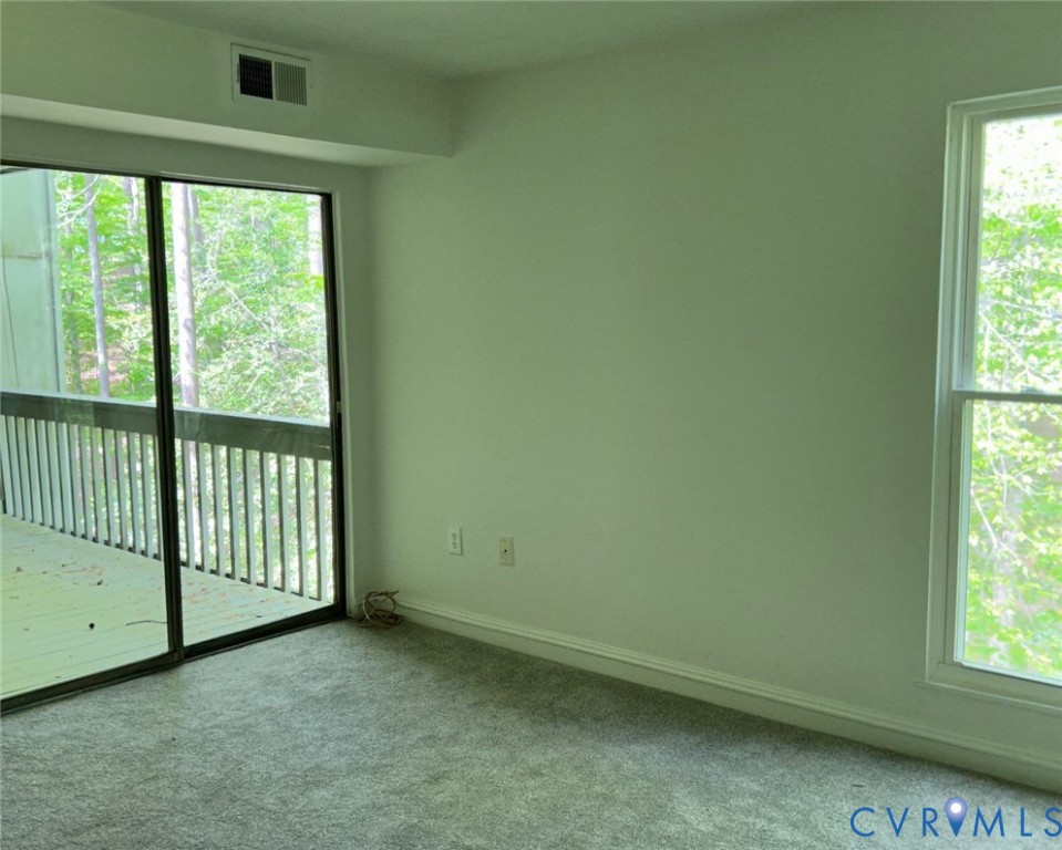10396 Iron Mill Road North Chesterfield, VA 23235 - Photo 9 of 23 a view of a room with a large window
