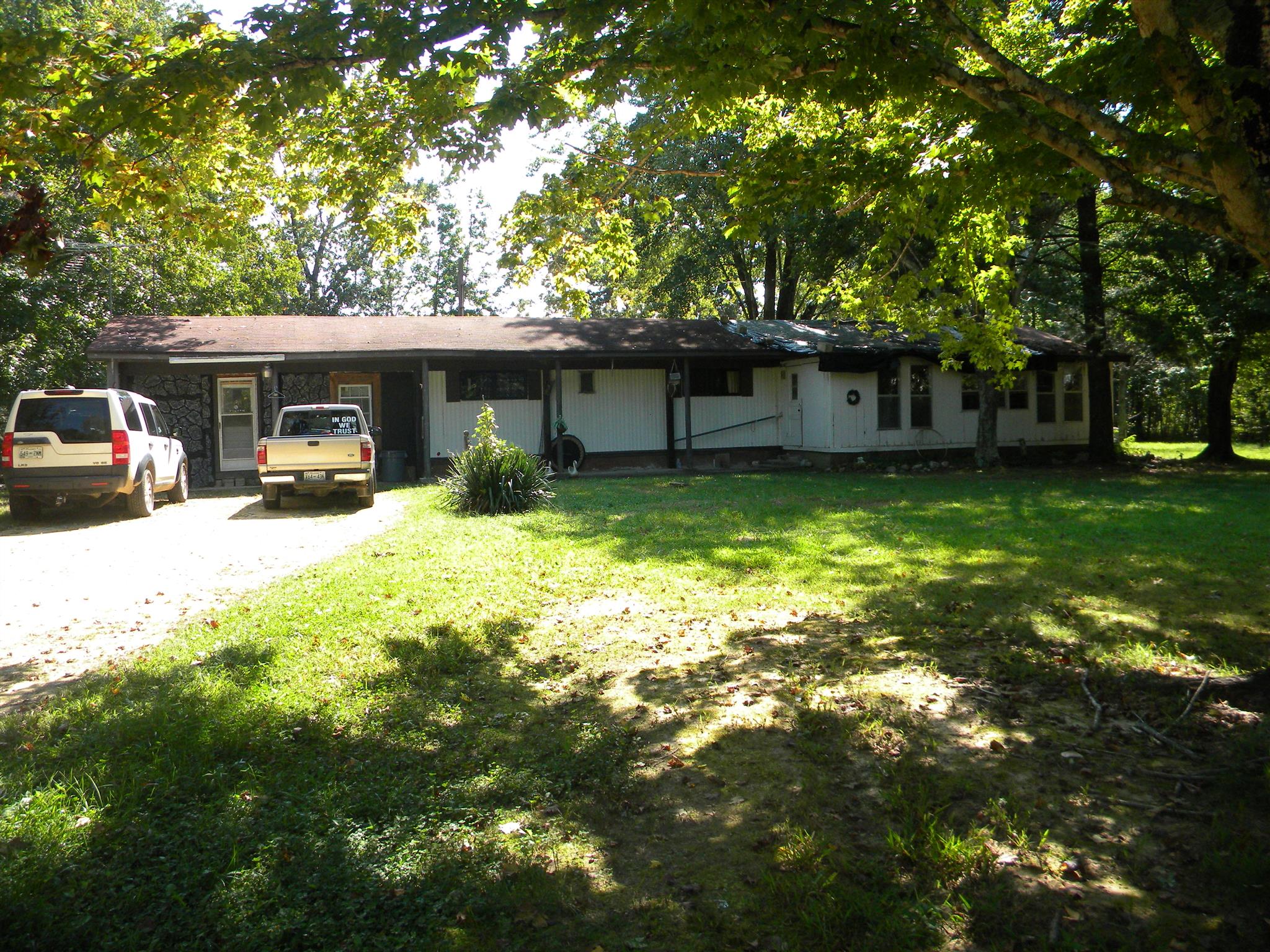 317 Garrison Road Hohenwald, TN 38462 - Photo 1 of 16 Home sets to the back of property