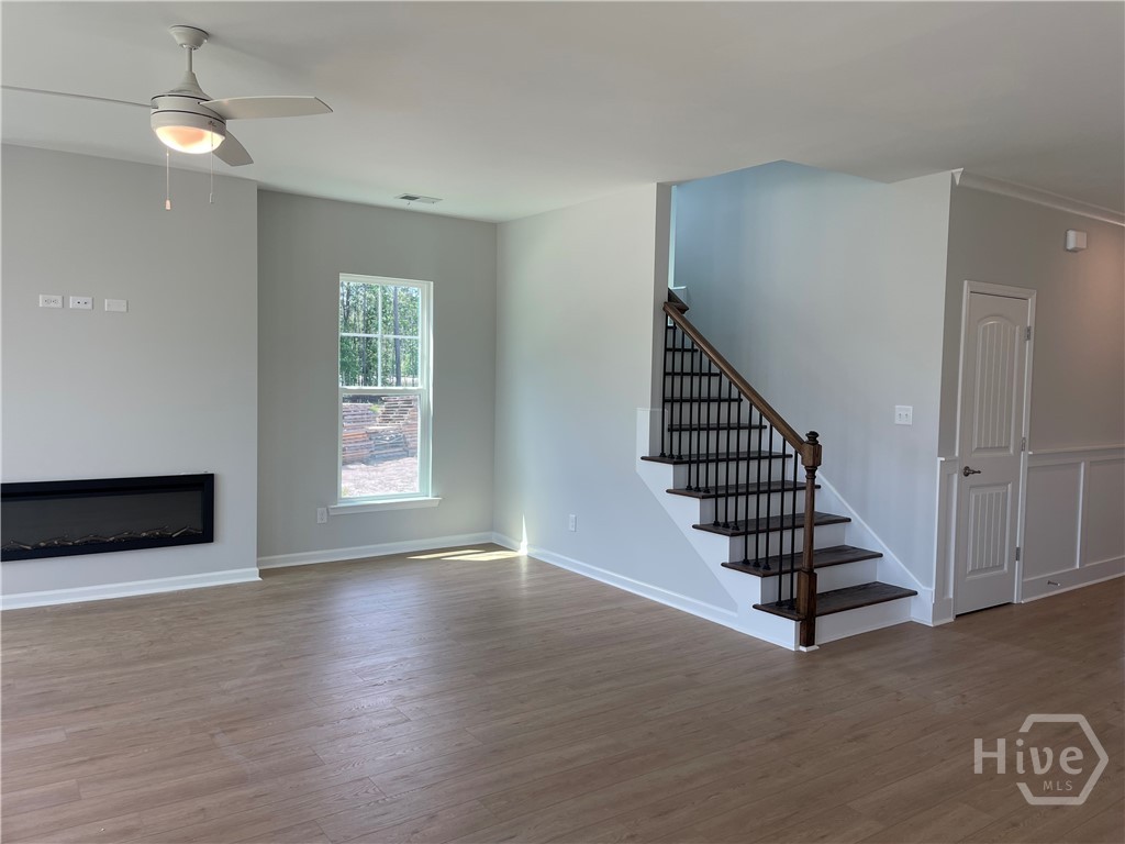 193 Champlain Drive Pooler, GA 31322 - Photo 8 of 19 Stained Oak Stairs