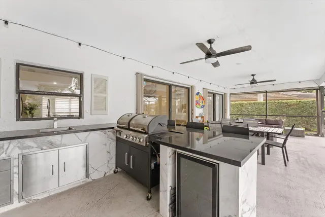 a view of a swimming pool with a porch