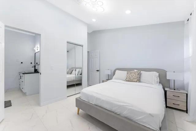a view of a bathroom with a bathtub and sink