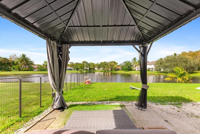 a view of a garden with houses