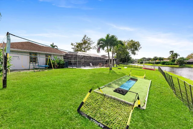 a view of a lake with a big yard