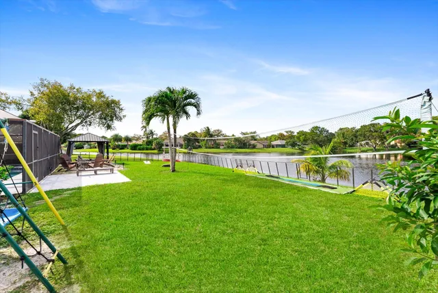 a view of a house with a big yard