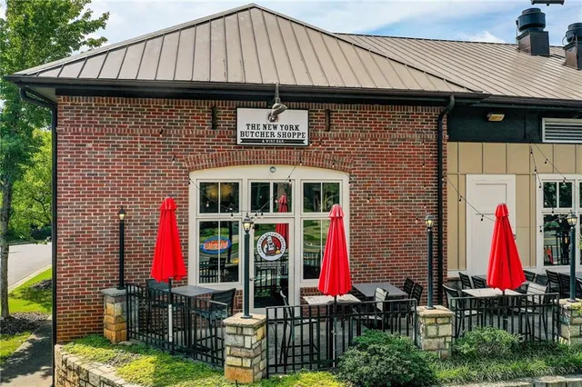 a view of a swimming pool with a garden
