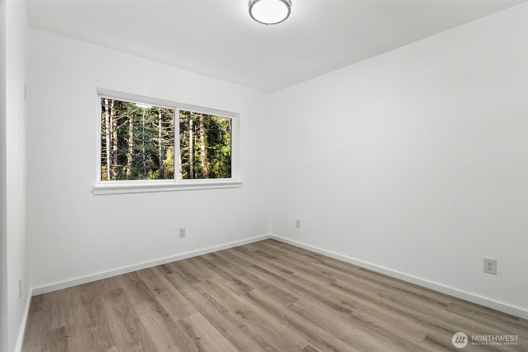 6925 Schweitzer Place Southwest Port Orchard, WA 98367 - Photo 22 of 32 an empty room with a window