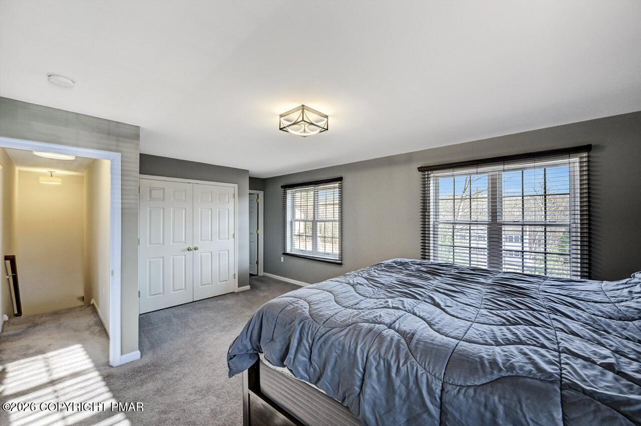 1013 Bear Swamp Road East Stroudsburg, PA 18302 - Photo 26 of 53 a bedroom with a bed and a window