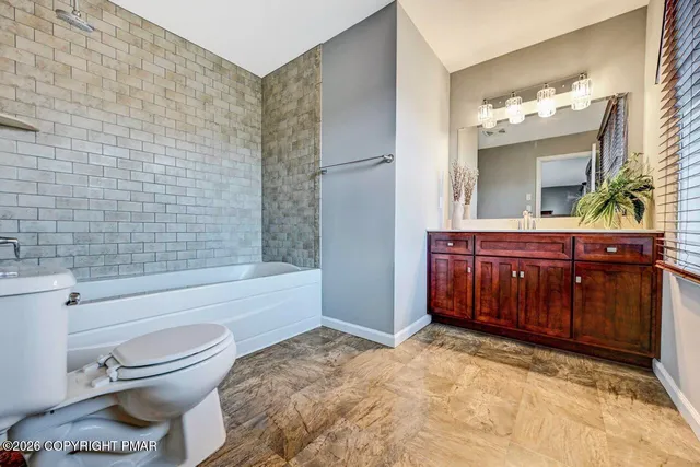 a bathroom with a bathtub