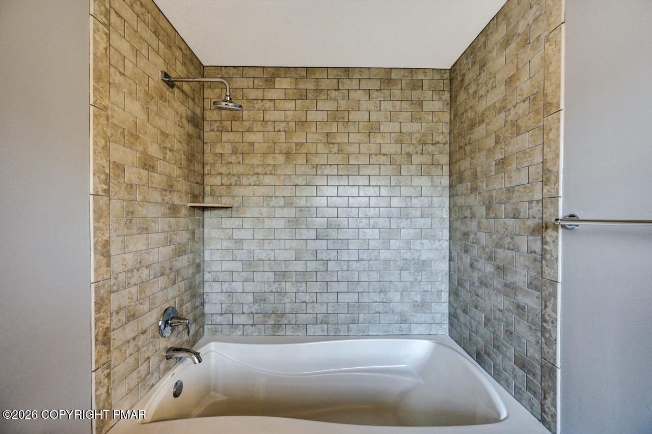 1013 Bear Swamp Road East Stroudsburg, PA 18302 - Photo 29 of 53 a bathroom with a bathtub